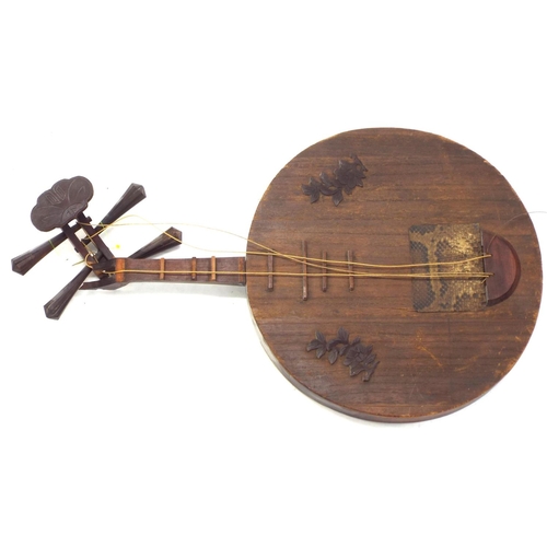 1241 - Decorative Thai Sueng lute; together with a Chinese yueqin moon lute and another Chinese lute (3)