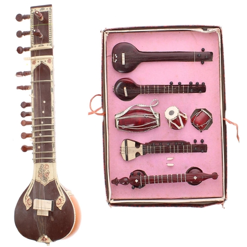 1247 - Miniature Indian sitar; together with a boxed set of miniature Indian musical instruments (2)