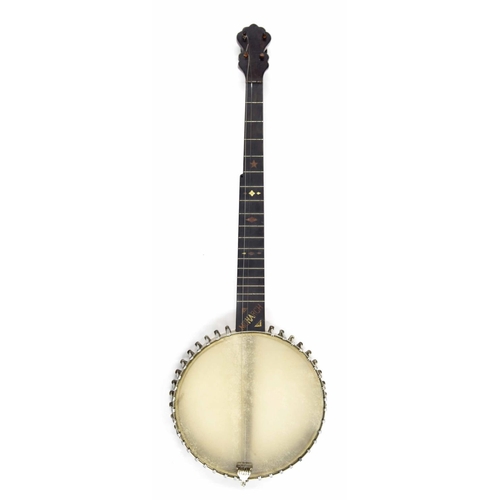 1210 - Monarch five string open back banjo circa 1900, with missing Mother of Pearl geometric inlay to the ... 