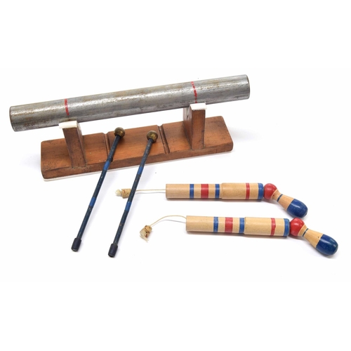1255 - Paul Chalklin - anvil bar effect on stand with a pair of mallets; together with a pair of pop gun ef... 