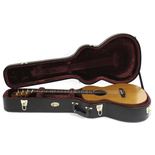 60 - 1993 Tony Revell small-bodied electro-acoustic guitar; Back and sides: walnut, minor dings; Top: wes... 