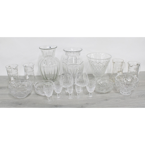 15 - Collection of cut glass and moulded glasswares, including three vases, four similar jugs and a selec... 