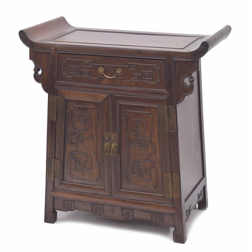 370 - Chinese hardwood altar cupboard, the upswept panelled top over single drawer over two cupboard doors... 