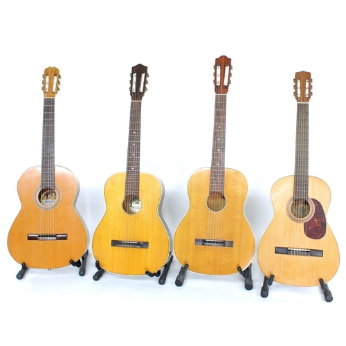 1343 - Restored Vicente Sanchis nylon string guitar; together with three further nylon string guitars to in... 