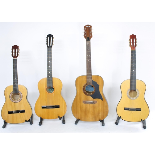 1351 - Four guitars to include a Russian nylon string, a WM steel string and two others, all in various sta... 
