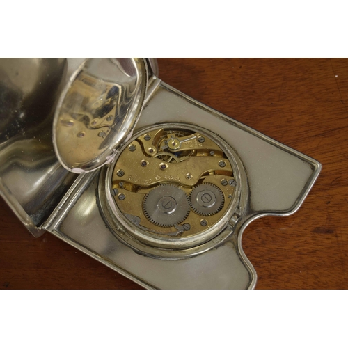 532 - George V folding silver cased travelling eight day clock, within an engine turned cigarette case, Co... 