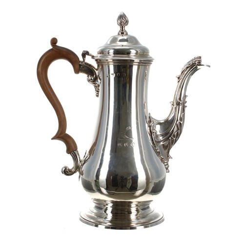 505 - George III silver pear shaped coffee pot, with a fruitwood handle and hinged cover and a spiral flut... 