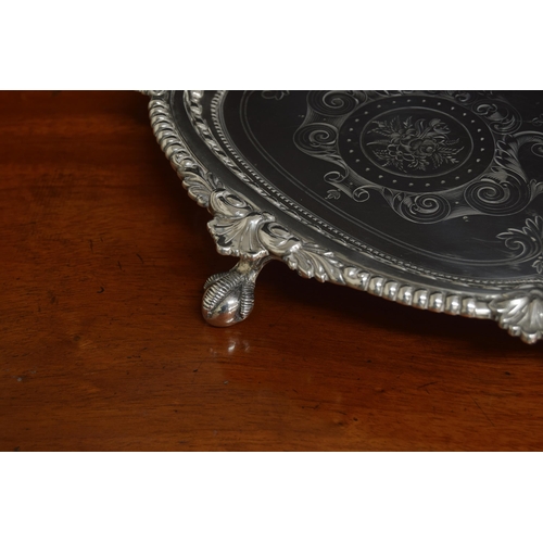 525 - Impressive large Victorian lobed circular silver salver, with engraved foliate motif decoration with... 