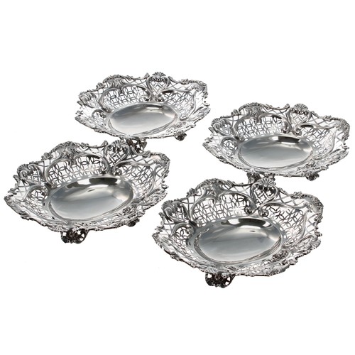 520 - Attractive late Victorian silver pierced oval cake basket with four matching bonbon dishes, each wit... 