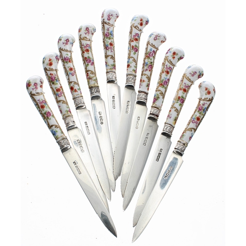 534 - Attractive set of ten porcelain handled fruit knives, with foliate and gilded pistol grips and ... 