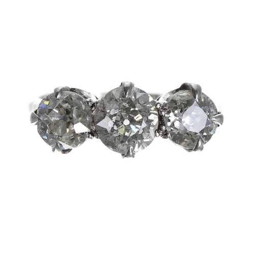 Good 18ct and platinum three stone diamond ring, consisting of three old-European-cut diamonds in rex style settings, estimated 0.87ct, 1.27ct, 0.96ct approx, clarity I, colour I-K, stamped 18ct and platinum, width 8mm, 3.4gm, ring size O/P