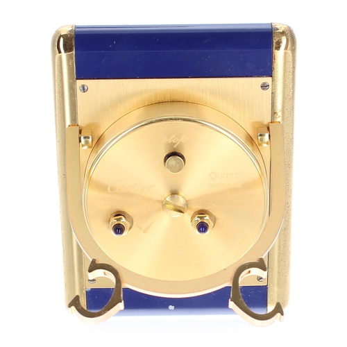 22 - Les Must de Cartier travel alarm clock, reference no. 7505, serial no. 02666 rectangular white dial,... 
