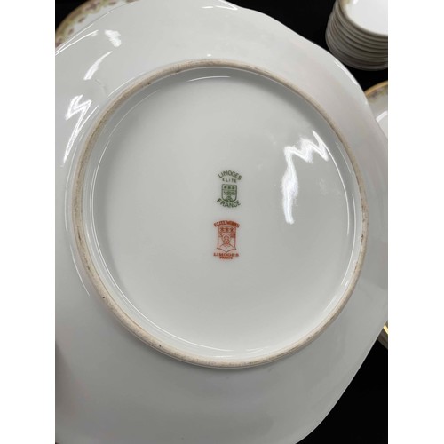 55 - Limoges Elite Works porcelain dinner service, decorated with rose borders and gilt highlighted rim, ... 