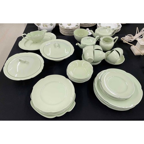 27 - Johnson Brothers 'Green Dawn' part dinner service comprising two teapots, milk jug and sugar bowl, s... 