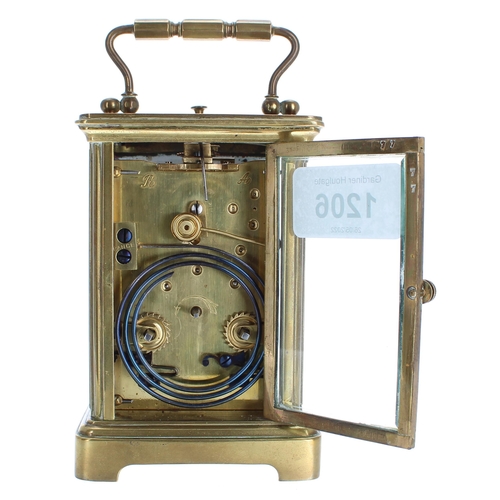 1206 - Small repeater carriage clock striking on a gong, within a corniche brass case, 6
