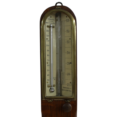 1011 - Oak stick barometer, the angled scale signed T. B. Winter, Optician, Newcastle on Tyn, corrected for... 