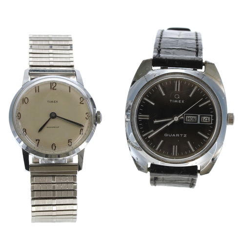409 - Timex Q Quartz Day-Date stainless steel gentleman's wristwatch, black leather strap, 38mm; together ... 
