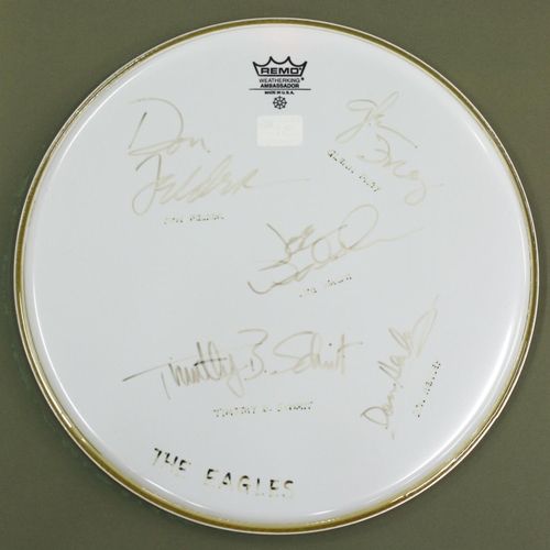 553 - The Eagles - autographed Remo drumskin signed by Joe Walsh, Don Felder, Glenn Frey, Don Henley and T... 