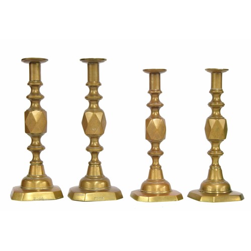 552 - Pair of Victorian 'The King of Diamonds' brass candlesticks, with wax ejectors, stamped to the bases... 