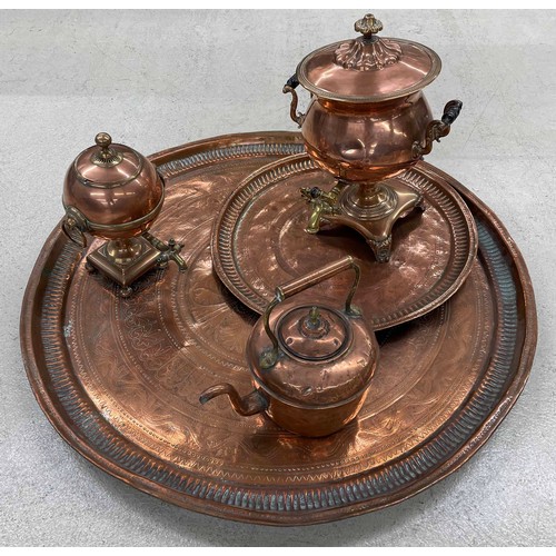 564 - Selection of antique copper to include a twin-handled samovar with brass tap, smaller globe samovar,... 