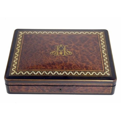 560 - French burr yew wood, kingwood and ebonised games box, the hinged cover with brass inlaid monogram a... 