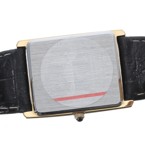 24 - Seiko Solar Tank gold plated gentleman's wristwatch, reference no. V115-0bO0, white dial, black leat... 