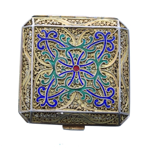 545 - Attractive Portuguese silver-gilt filigree and enamel compact case, square with cut corners, the hin... 