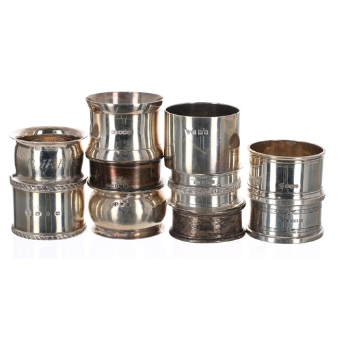 534 - Twelve assorted silver napkin rings, together wth two small silver cups, 10.5 oz t silver; together ... 