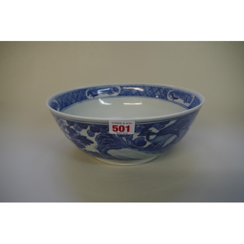501 - A Chinese blue and white bowl, 19th century, painted with a bird and butterflies, 28cm diameter.... 