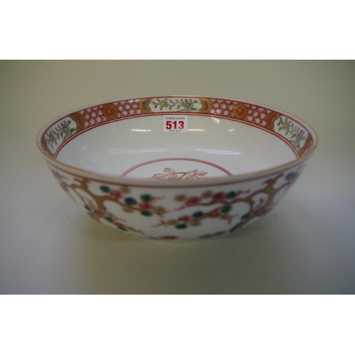 513 - A famille rose bowl, painted and gilded with flowering prunus trees, 23cm diameter.... 
