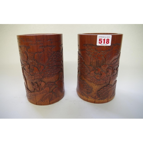 518 - A pair of Chinese carved bamboo brush pots bitongs, 19th century, painted character mark to bas... 