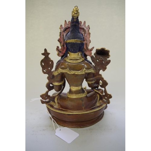 525 - A Sino-Tibetan gilt bronze figure of Tara, 21cm high.