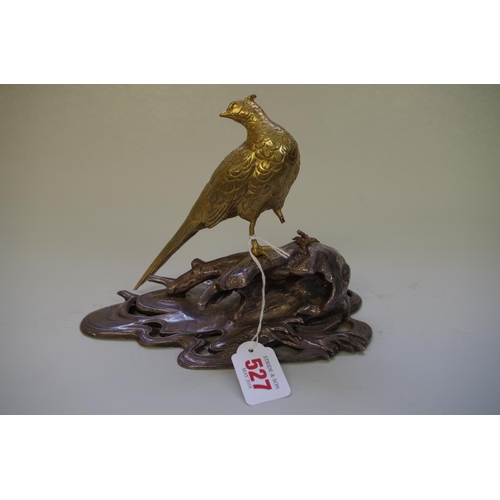 527 - An Oriental brass and electroplate model of a pheasant, signed on tablet, 22.5cm wide.... 