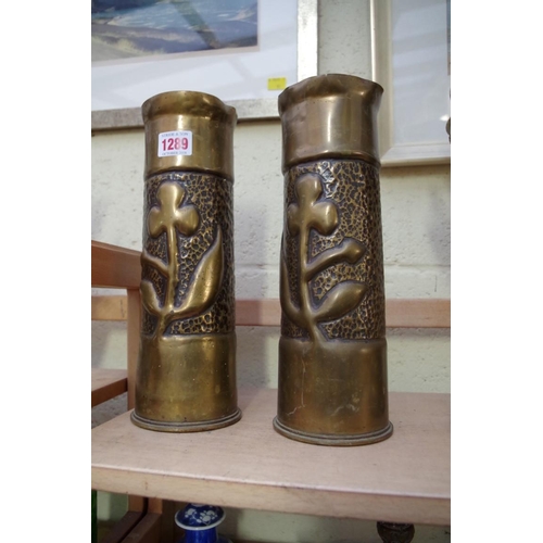 1289 - A pair of trench art brass vases, 29cm high.
