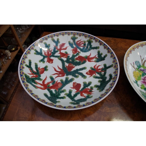 1332 - Two Chinese large circular dishes, largest 37cm diameter.