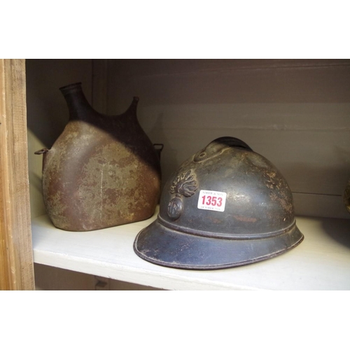 1353 - A French World War I M15 Adrian helmet; together with a similar metal bottle. (2)