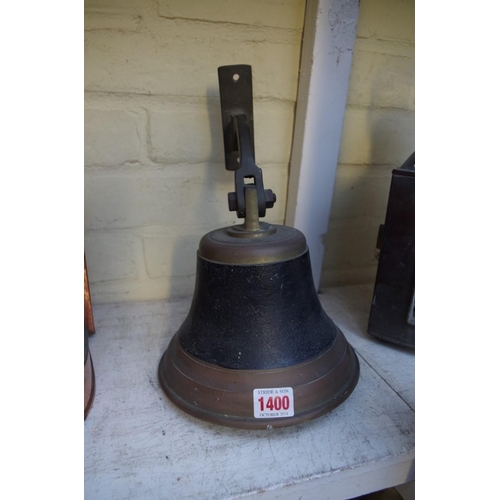 1400 - An old wall mounted bell, with clapper. 