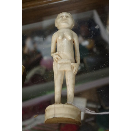 1726 - Ethnographica: an ivory figure of a lady, 16cm high. 