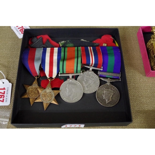 1771 - A World War II medal group, to 14418309 RFND Goulding KRRC; together with related badges. ... 