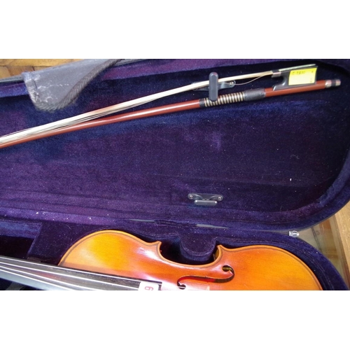 1929 - An antique Continental violin, with single piece 14in back, with bow and padded case.... 