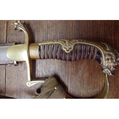 1959 - A World War I era Imperial German lion's head pattern cavalry officer's sword and scabbard.  new pri... 