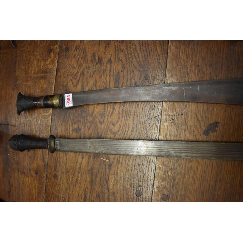 1964 - An antique sword, having 53cm blade and twisted wire grip; together with another eastern sword. (2)... 