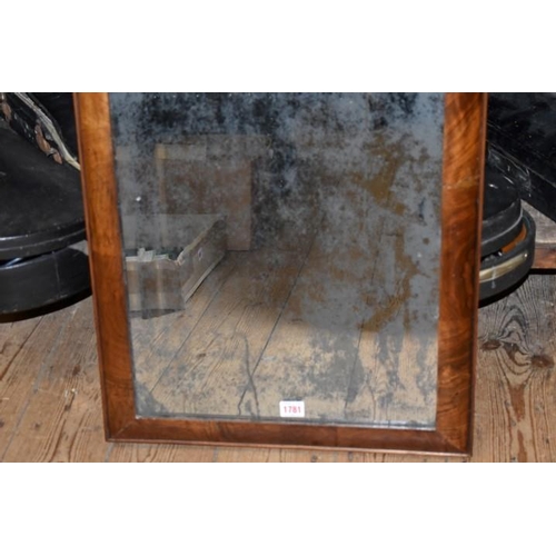 1781 - An early 18th century walnut crossgrain framed pier mirror, 112 x 49.5cm.