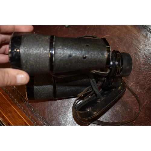 1874 - A pair of World War II German 7x50 binoculars, by Carl Zeiss, inscribed '2187384 blc', cased.... 