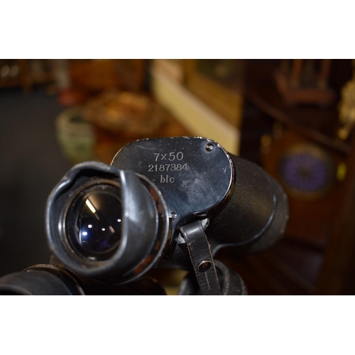 1874 - A pair of World War II German 7x50 binoculars, by Carl Zeiss, inscribed '2187384 blc', cased.... 
