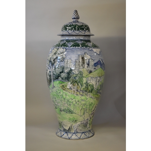 1733 - A very large Dutch polychrome painted vase and cover, 91.5cm high.
