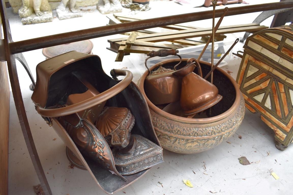 A collection of copperware.