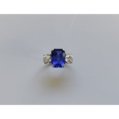 296 - A good 9.5ct natural Ceylonese sapphire and diamond ring, the two old European cut diamonds  approx ... 