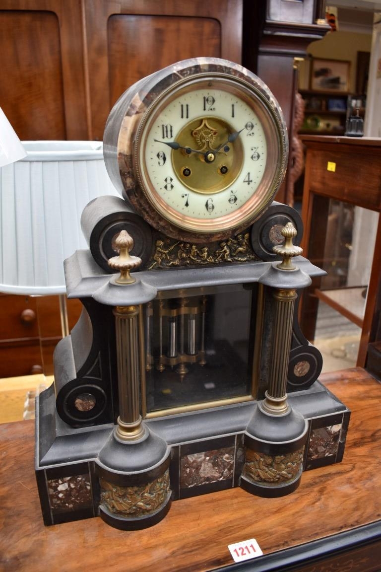 A Victorian slate and marble mantel clock,