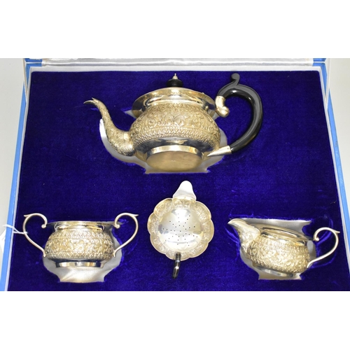 30 - A cased Indian white metal four piece teaset, stamped 'silver' to base, 821g all in.... 